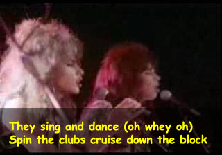 They sing and dance (oh whey oh). Spin the clubs cruise down the block.